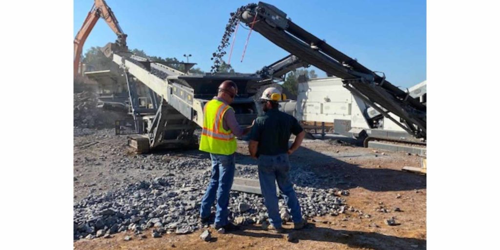 crushing experts on a job site