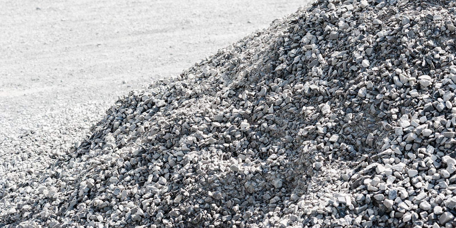 pile of rocks cascading down a larger hill