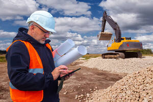 A project supervisor checking types of crushers